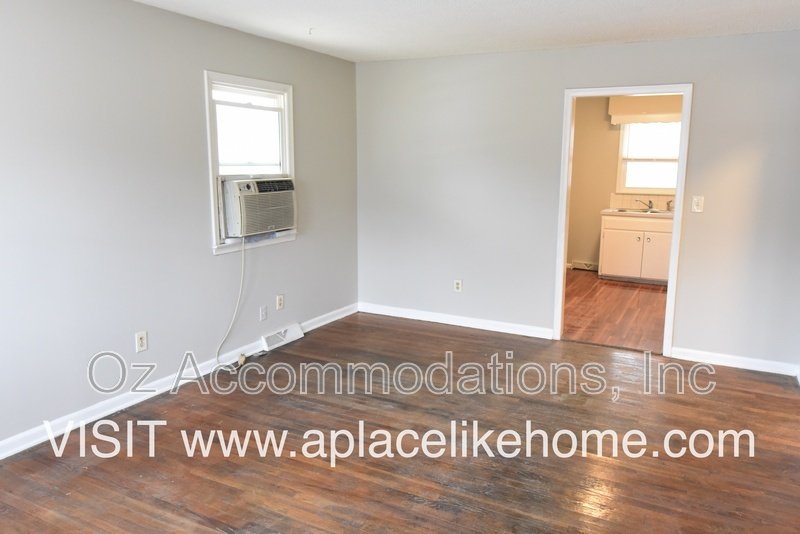 Charming 2-Bedroom Duplex with Hardwood Floors, 2-Car Garage & Window A/C property image