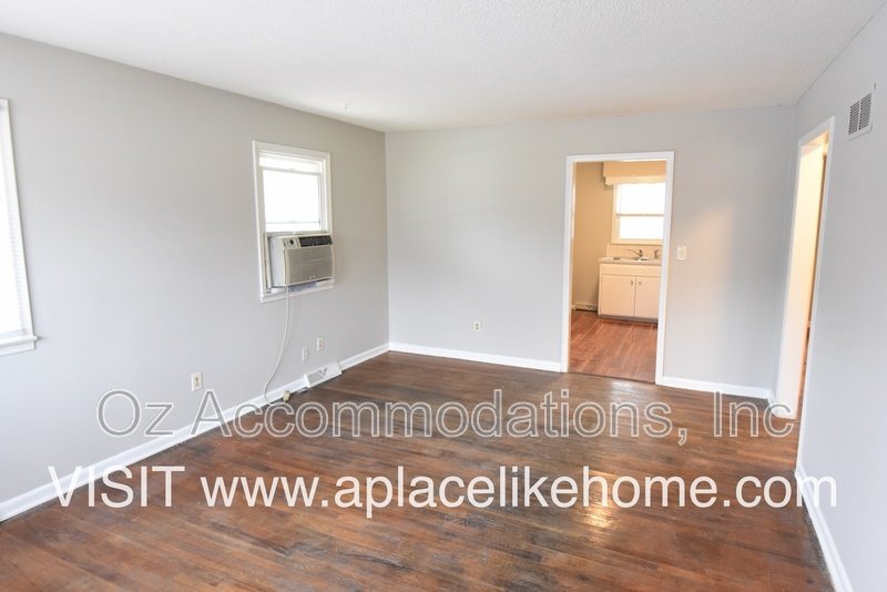 Charming 2-Bedroom Duplex with Hardwood Floors, 2-Car Garage & Window A/C property image