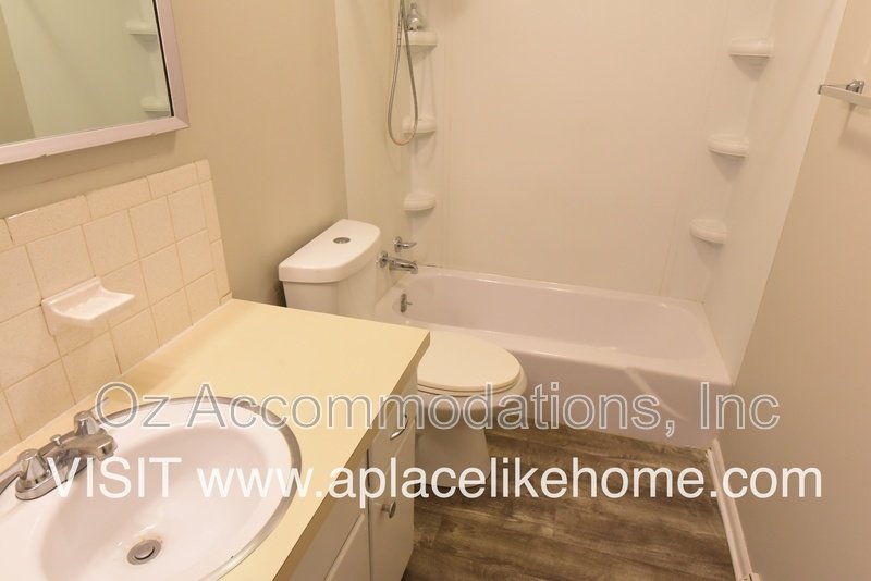 Charming 2-Bedroom Duplex with Hardwood Floors, 2-Car Garage & Window A/C property image