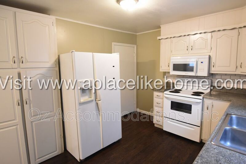 Sprawling 4-Bed Home in Raytown with Fenced Yard & Garage! property image